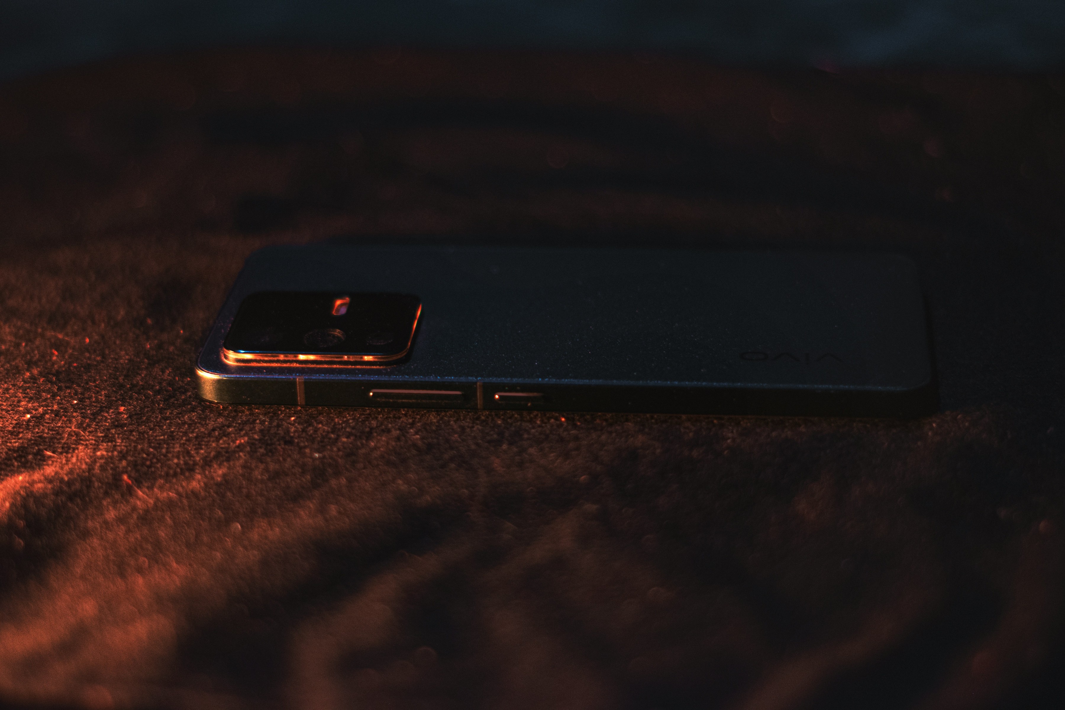 black smartphone on a dark background